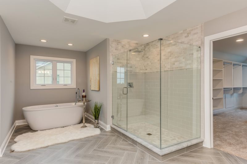 Bathroom featuring a walk-in shower with glass enclosure